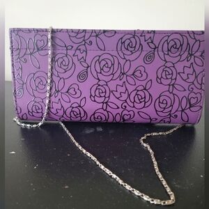 Purple purse and also a clutch